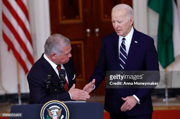 President Joe Biden shakes hands with King of Jordan Abdullah II ibn Al Hussein after delivering remarks to members of the media at the White House...