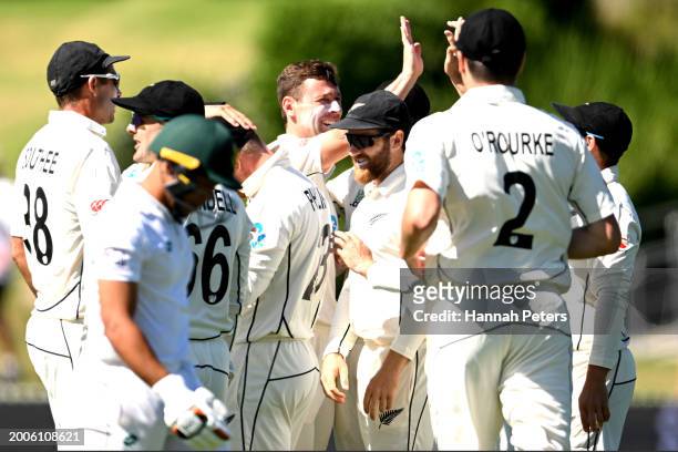 Glenn Phillips of the New Zealand Black Caps celebrates after making a catch to dismiss Clyde Fortuin of South Africa during day one of the Men's...