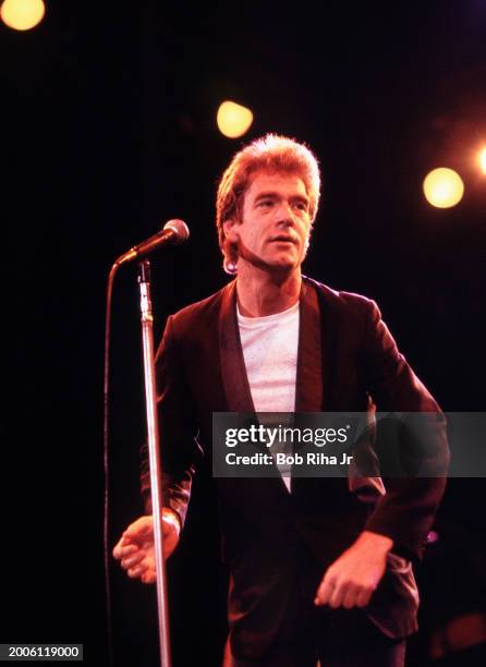 Singer Huey Lewis and The News perform at Irvine Meadows Amphitheatre, April 24, 1984 in Irvine, California.