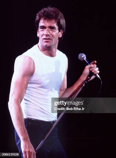 Singer Huey Lewis and The News perform at Irvine Meadows Amphitheatre, April 24, 1984 in Irvine, California.