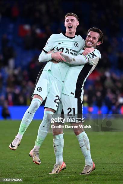 Cole Palmer and Ben Chilwell of Chelsea celebrate victory following the Premier League match between Crystal Palace and Chelsea FC at Selhurst Park...