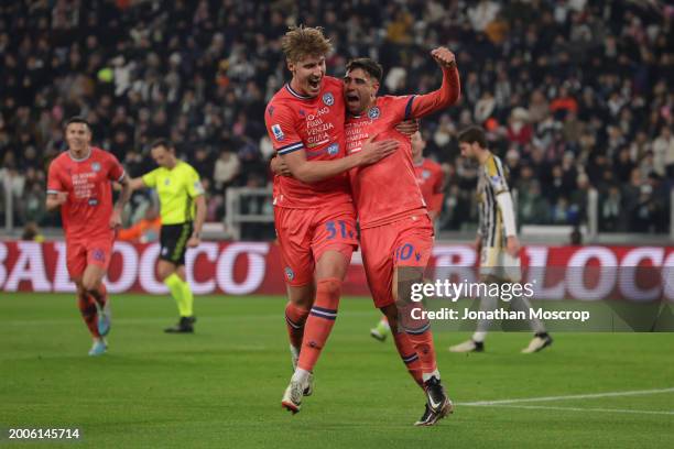 Lautaro Giannetti of Udinese Calcio celebrates with team mates after scoring to give the side a 1-0 lead during the Serie A TIM match between...