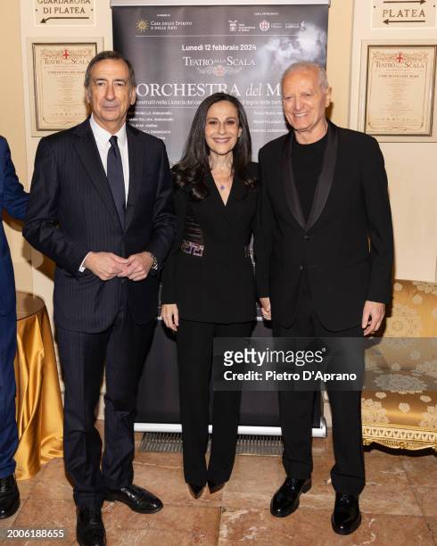 Beppe Sala, Francesca De Stefano and Santo Versace attends a photocall for "L'Orchestra Del Mare" at Teatro Alla Scala on February 12, 2024 in Milan,...