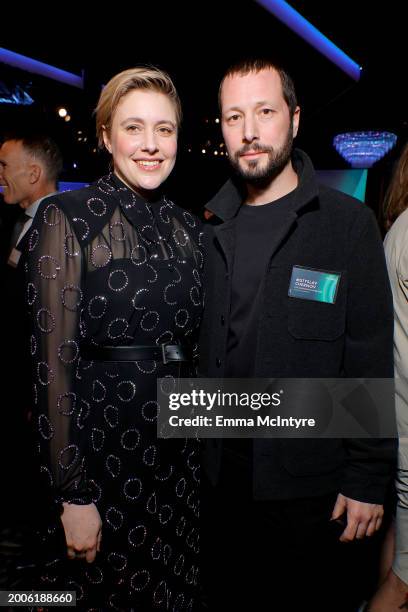 Greta Gerwig and Mstyslav Chernov attend the 96th Oscars Nominees Luncheon at The Beverly Hilton on February 12, 2024 in Beverly Hills, California.