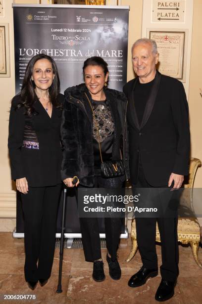 Francesca De Stefano, Giusy Versace and Santo Versace attends a photocall for "L'Orchestra Del Mare" at Teatro Alla Scala on February 12, 2024 in...