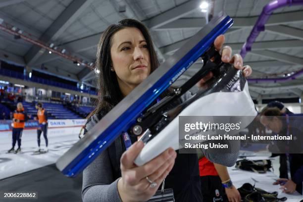 Corner judge Melanie Winters checks skate blades before day 1 of the ISU World Single Distances Speed Skating Championships at Olympic Oval on...