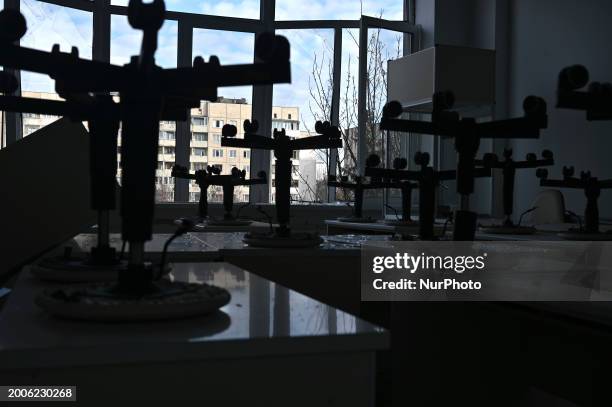 Stools are being placed on tables in a classroom at a school that is being damaged in the Russian missile attack in Lviv, Ukraine, on February 15,...