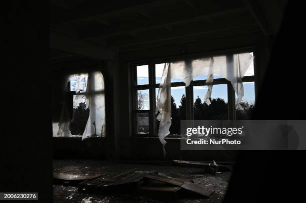 Shattered windows are being pictured at a school in Lviv, Ukraine, on February 15 after a Russian missile attack. Air defense forces are managing to...