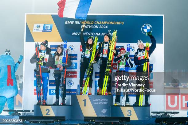 Tommaso Giacomel of Italy takes second place, Lisa Vittozzi of Italy takes second place, Lou Jeanmonnot of France takes first place, Quentin Fillon...