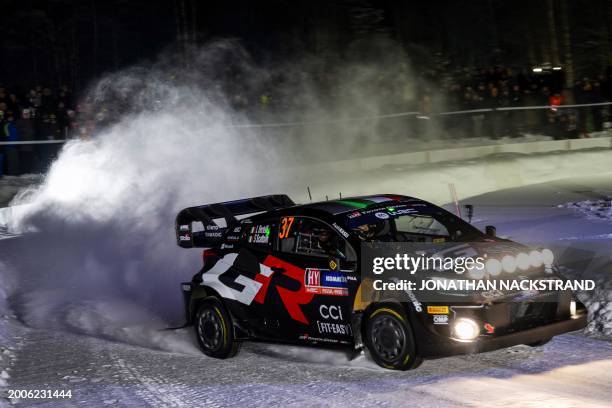 Lorenzo Bertelli of Italy and his co-driver Simone Scattolin of Italy steer their Toyota GR Yaris Rally1 HYBRID during the Umea Sprint 1, 1st stage...