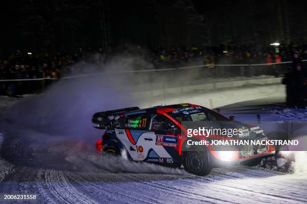 Thierry Neuville of Belgium and his co-driver Martin Wydaeghe of Belgium steer their Hyundai i20 N Rally1 HYBRID during the Umea Sprint 1, 1st stage...