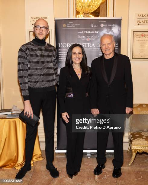 Mattia Boffi Valagussa, Francesca De Stefano and Santo Versace attends a photocall for "L'Orchestra Del Mare" at Teatro Alla Scala on February 12,...