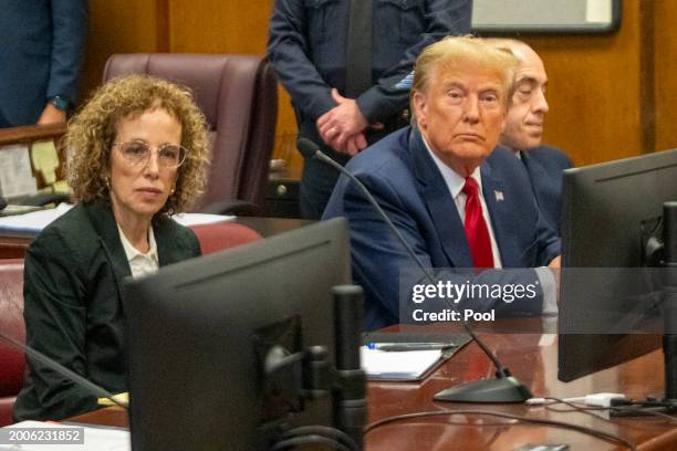 Republican presidential candidate, former U.S. President Donald Trump sits with attorney Susan Necheles during a pre-trial hearing at Manhattan...