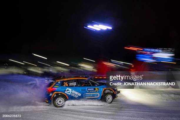 Lauri Joona of Finland and his co-driver Janni Hussi of Finland steer their Skoda Fabia RS during the Umea Sprint 1, 1st stage of the Rally Sweden,...