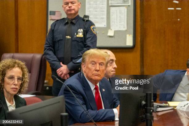 Republican presidential candidate, former U.S. President Donald Trump sits with attorney Susan Necheles during a pre-trial hearing at Manhattan...