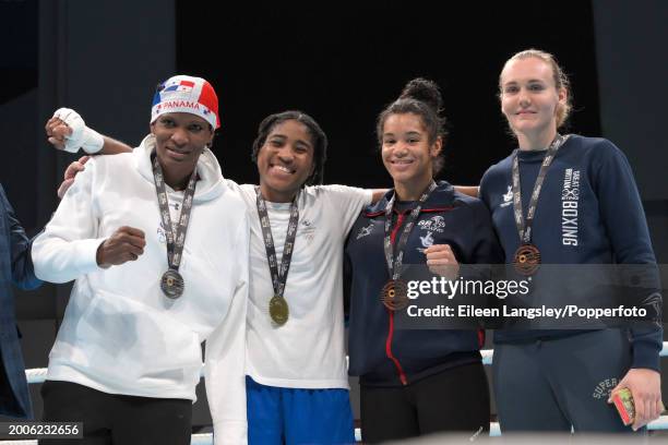 The medallists Atheyna Bylon , Cindy Ngamba , Chantelle Reid and Kerry Davis pose after the women's middleweight on day four of the World Boxing Cup:...