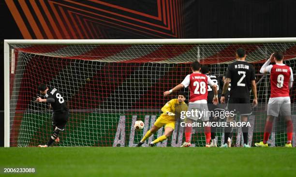 Garabagh's Montenegrin midfielder Marko Jankovic scores the opening goal from the penalty spot during the UEFA Europa League group stage first leg...