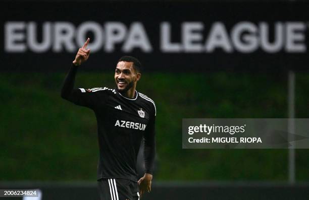 Garabagh's Brazilian forward Juninho celebrates scoring his team's third goal during the UEFA Europa League group stage first leg football match SC...