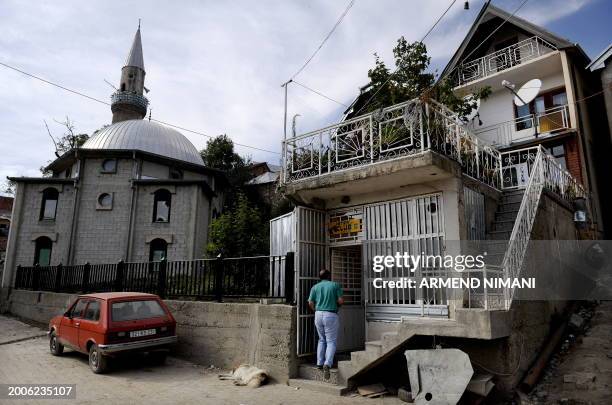 By Pierre Glachant. A Kosovo Gorani man enters an internet cafe next to a mosque in the village of Globocica on September 23, 2009. A tiny community...