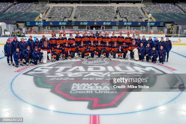 The New York Islanders pose for a team photo during the 2024 Navy Federal Credit Union Stadium Series - New York Islanders Practice & Family Skate at...