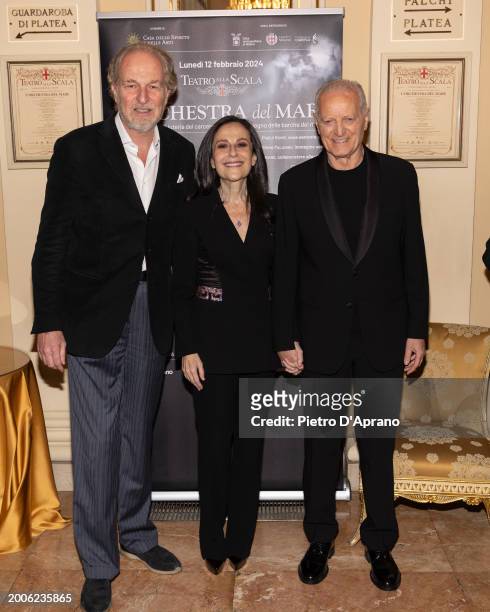 Arturo Artom, Francesca De Stefano and Santo Versace attends a photocall for "L'Orchestra Del Mare" at Teatro Alla Scala on February 12, 2024 in...