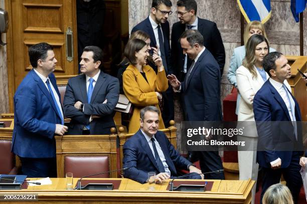 Kyriakos Mitsotakis, Greece's prime minister, center, waits for the results of a vote on the same-sex marriage bill in parliament in Athens, Greece,...