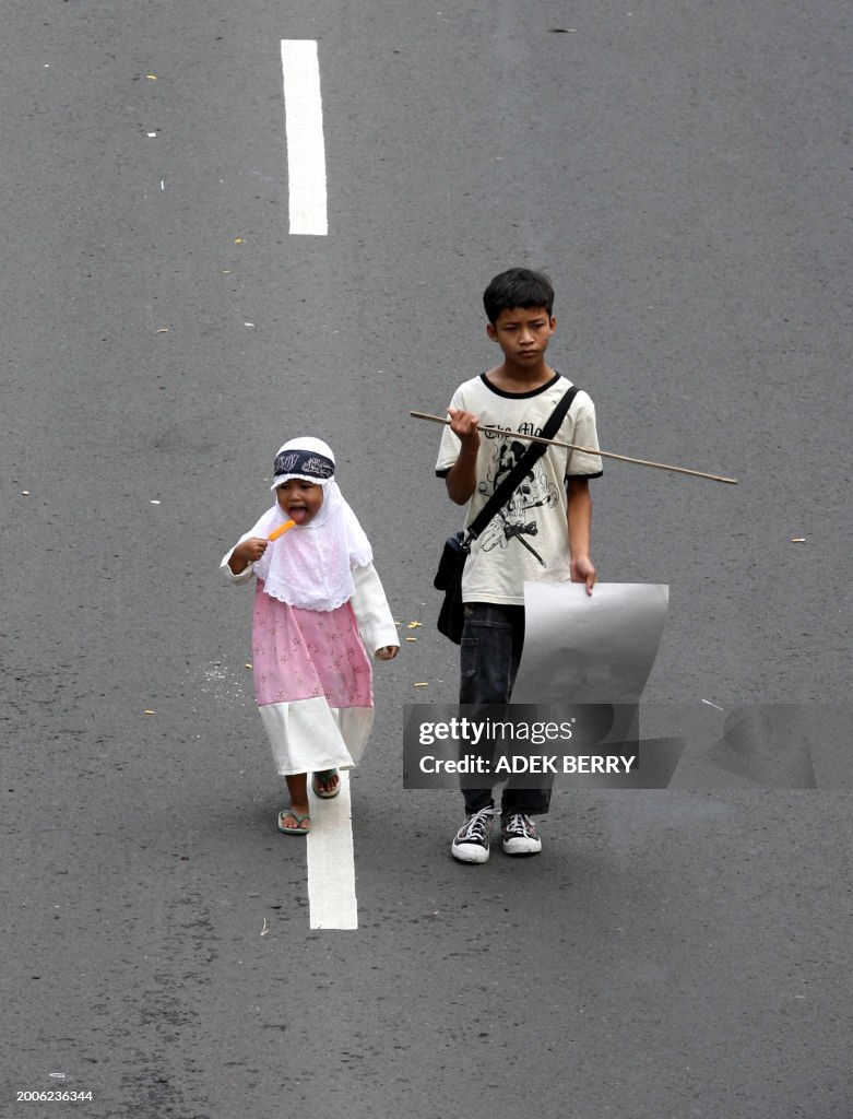 Islamic Rally Two young Indonesian Muslim of Hizbuth Tahrir rally in Jakarta, 09 ...