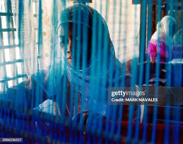 Arira Esmael, 21-years-old weaves traditional Muslim fabric at the Al Jamelah organization in Tamontaka Dos Maguindanao southern Philippines, 23...