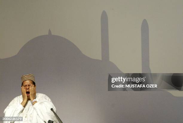 An unidentified delegate is pictured during on the last day of the OIC meeting in Istanbul 16 June 2004. Ministers from the world's Muslim countries...