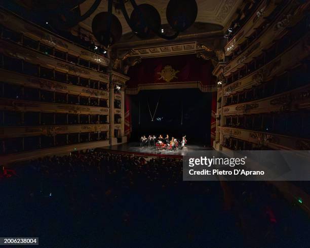 The cast of the L'Orchestra Del Mare performs at Teatro Alla Scala on February 12, 2024 in Milan, Italy.