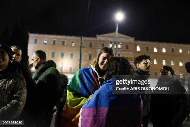 People celebrate the voting of same-sex marriage and the extension of same-sex couples parental rights by Greek parliament in Athens Greece on...