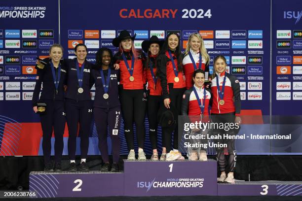 Silver medal winner United States, gold medal winner Canada and bronze medal winner Poland pose with their medals after the Women Team Sprint during...