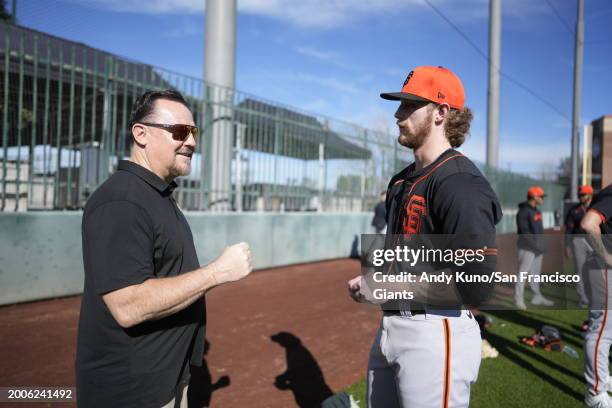 Dave Groeschner talks to Carson Whisenhunt of the San Francisco Giants during the workout at Scottsdale Stadium on February 15, 2024 in Scottsdale,...