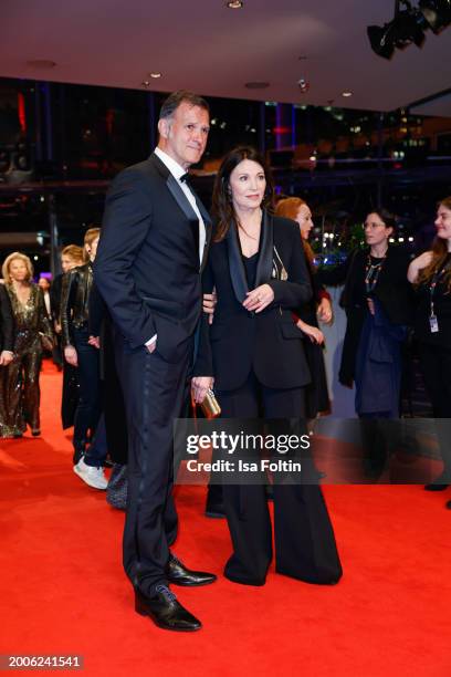 Heiko Kiesow and Iris Berben during the "Small Things Like These" premiere and Opening Red Carpet for the 74th Berlinale International Film Festival...