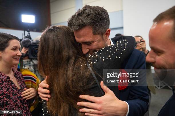 Labour Party candidate, Damien Egan, is hugged after being declared the winner in the Kingswood by-election on February 16, 2024 in Thornbury,...