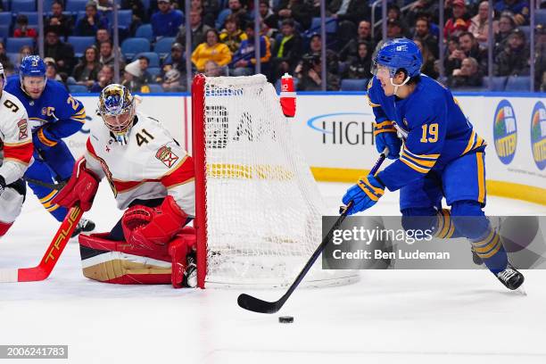 Anthony Stolarz of the Florida Panthers tends goal against Peyton Krebs of the Buffalo Sabres during an NHL game on February 15, 2024 at KeyBank...