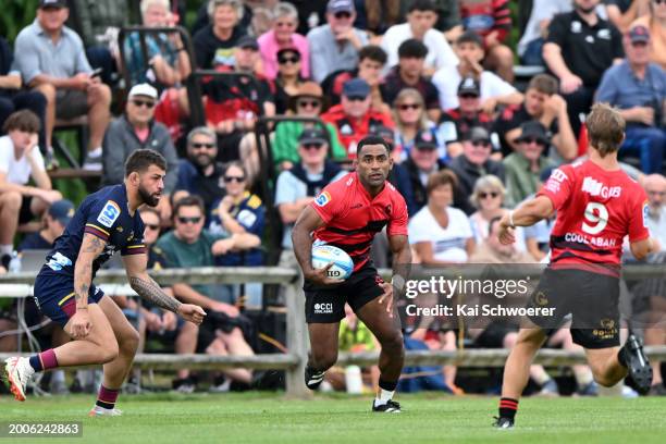 Sevu Reece of the Crusaders charges forward during the Super Rugby Pacific Pre-Season Match between Crusaders and Highlanders at Methven Recreational...