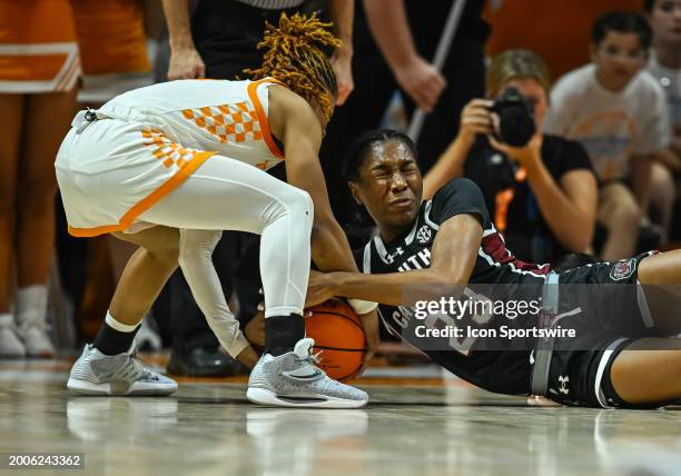 South Carolina Gamecocks guard Bree Hall and Tennessee Lady Vols guard Jasmine Powell fight for a loose ball during the women's college basketball...