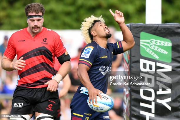 Antonio Shalfoon of the Crusaders reacts as Folau Fakatava of the Highlanders celebrates scoring a try during the Super Rugby Pacific Pre-Season...