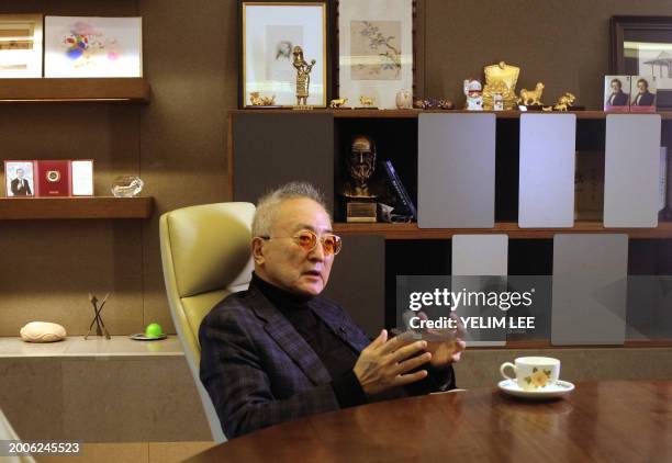 This picture taken on November 8, 2023 shows CHA Medical Group chairman Cha Kwang-yul speaking during an interview with AFP at his office in...