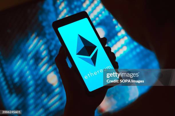 In this photo illustration, the Ethereum logo is displayed on a smartphone screen.