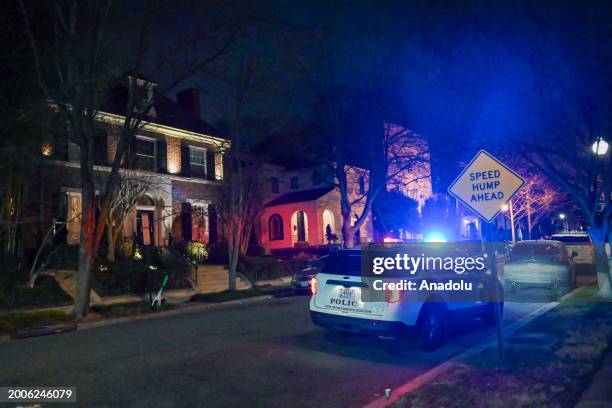 View of a police car as the FBI and United States Secret Service officers raid the Venezuelan Ambassador's Residence in Washington, DC, United States...