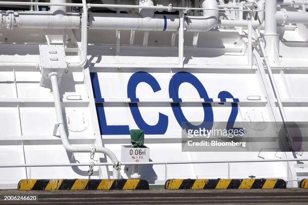 Signage on a cargo tank on the Excool, a demonstration test ship for liquified carbon dioxide transport, moored at the Daikoku pier in Yokohama,...