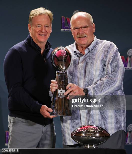 Commissioner Roger Goodell hands the Vince Lombardi Trophy to head coach Andy Reid of the Kansas City Chiefs as they pose during a news conference...