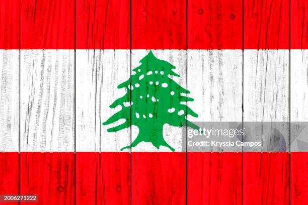 flag of lebanon painted on a wooden plaque - lebanon flag stock pictures, royalty-free photos & images