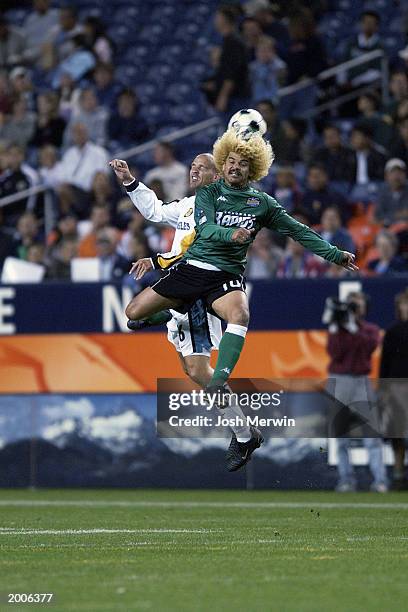 Midfielder Carlos Valderrama of the Colorado Rapids heads the ball over defender Craig Waibel of the Los Angeles Galaxy in game 2 of the MLS...