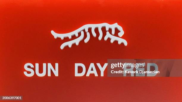 Signage is displayed during the launch of Tiger Woods and TaylorMade Golf's new apparel and footwear brand "Sun Day Red" at Palisades Village on...