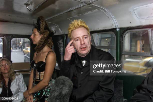 Bill Tompkins / Getty Images ) Punk rock singer John Lydon aka Johnny Rotten of the band The Sex Pistols and Public Image Limited with his...