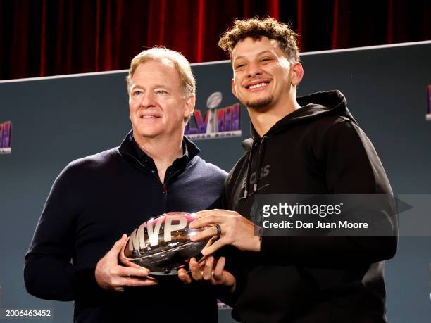 Commisioner Roger Goodell and Quarterback Patrick Mahomes of the Kansas City Chiefs pose while being presented the Pete Rozelle Trophy as Super Bowl...