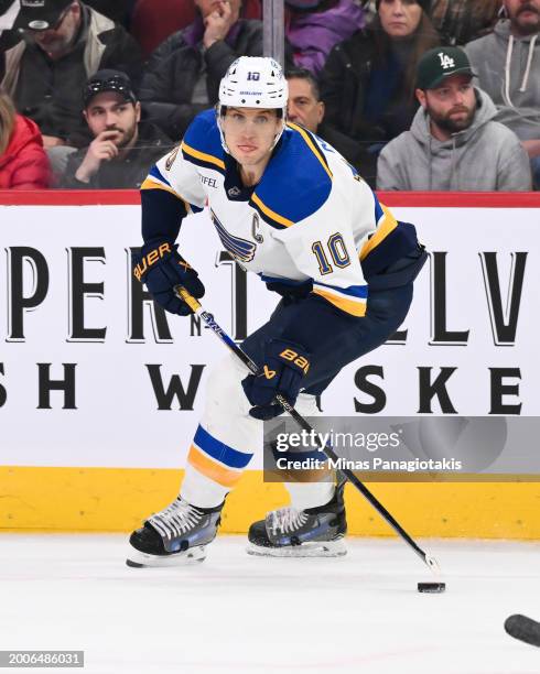 Brayden Schenn of the St. Louis Blues skates the puck during the first period against the Montreal Canadiens at the Bell Centre on February 11, 2024...